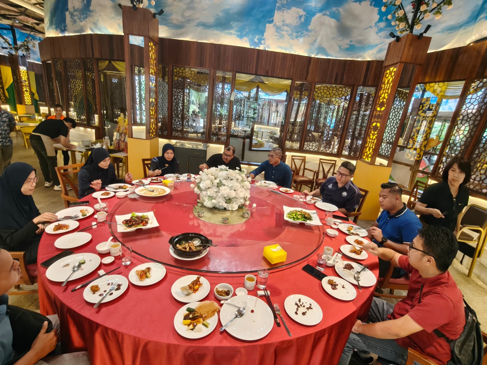 Group dining around a round table